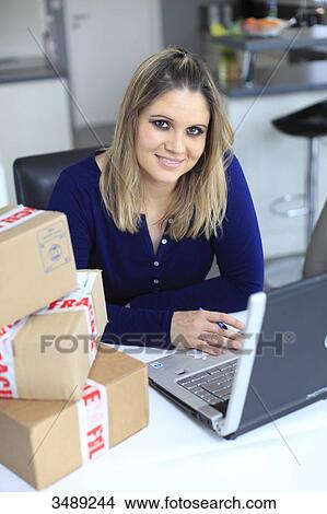France, young woman, online shopping View Large Photo Image Picture - France, young woman, online shopping. Fotosearch