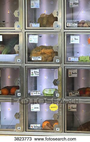 Stock Image - Fruits and vegetables vending machine. Fotosearch