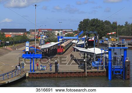 Stock Image - Germany, Lower Saxony. Borkum Island. Railway station upon the ferry's arrival.. Fotosearch
