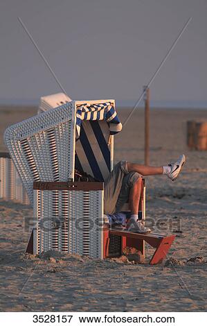 Germany, Nordfriesland, Schleswig-Holstein, Sankt Peter Ording or St Peter Ording is the biggest seaside resort in Germany. View Large Photo Image Stock Photo - Germany, Nordfriesland, Schleswig-Holstein, Sankt Peter Ording or St Peter Ording is the biggest seaside resort in Germany.. Fotosearch
