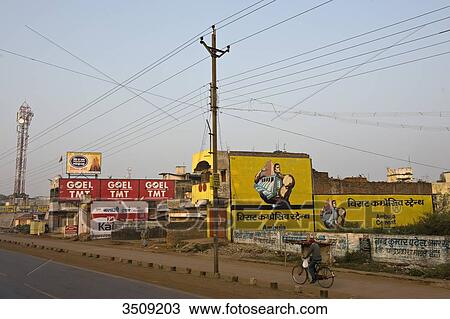 Stock Image - India, Chhattisgarh, Antenna and painted advertisment. Fotosearch