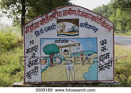 India, Chhattisgarh, Panel recalling the National Rural Employment Act of Mahatma Gandhi View Large Photo Image Stock Photo - India, Chhattisgarh, Panel recalling the National Rural Employment Act of Mahatma Gandhi. Fotosearch