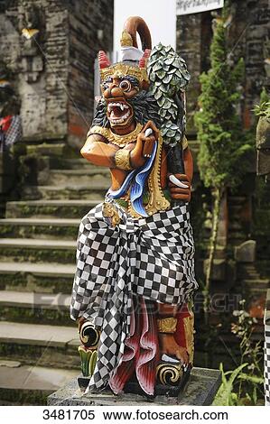 Indonesia, Bali, Bedugul, Statue in the temple of Ulu Ulun Danu. The temple of Ulu Ulun Danu is located on the shores of Lake Bratan. The Temple is dedicated to the goddess of waters View Large Photo Image Stock Photography - Indonesia, Bali, Bedugul, Statue in the temple of Ulu Ulun Danu. The temple of Ulu Ulun Danu is located on the shores of Lake Bratan. The Temple is dedicated to the goddess of waters. Fotosearch