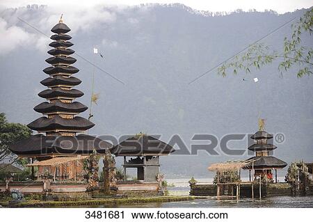 Indonesia, Bali, Bedugul, the temple of Ulun Danu is located at the edge of Lake Bratan The Temple with its Atap Meru (bunk roofs) of 11 roofs is dedicated to the goddess of waters View Large Photo Image Stock Image - Indonesia, Bali, Bedugul, the temple of Ulun Danu is located at the edge of Lake Bratan The Temple with its Atap Meru (bunk roofs) of 11 roofs is dedicated to the goddess of waters. Fotosearch