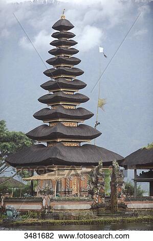Indonesia, Bali, Bedugul, the temple of Ulun Danu is located on the shores of Lake Bratan. The Temple with its Atap Meru (bunk roofs) of 11 roofs is dedicated to the goddess of waters View Large Photo Image Stock Image - Indonesia, Bali, Bedugul, the temple of Ulun Danu is located on the shores of Lake Bratan. The Temple with its Atap Meru (bunk roofs) of 11 roofs is dedicated to the goddess of waters. Fotosearch