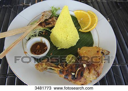 Indonesia, Bali, Gastronomy, turmeric rice (Indian saffron), chicken, fish brochette View Large Photo Image Stock Image - Indonesia, Bali, Gastronomy, turmeric rice (Indian saffron), chicken, fish brochette. Fotosearch