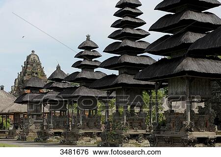 Indonesia, Bali, Mengwi, the royal temple of Taman Ayun. Taman Ayun means pretty garden. Built in the 17th Century, it is surrounded by a ditch of water. The bunk roofs are called Atap Meru. The temple is a UNESCO World Heritage site. View Large Photo Image Stock Photograph - Indonesia, Bali, Mengwi, the royal temple of Taman Ayun. Taman Ayun means pretty garden. Built in the 17th Century, it is surrounded by a ditch of water. The bunk roofs are called Atap Meru. The temple is a UNESCO World Heritage site.. Fotosearch