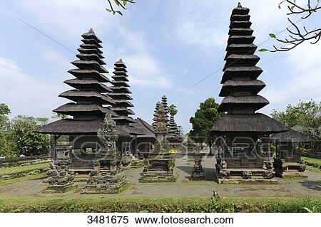 Indonesia, Bali, Mengwi, the royal temple of Taman Ayun. Taman Ayun means pretty garden. Built in the 17th Century, it is surrounded by a ditch of water. The bunk roofs are called Atap Meru. The temple is a UNESCO World Heritage site. View Large Photo Image Stock Photography - Indonesia, Bali, Mengwi, the royal temple of Taman Ayun. Taman Ayun means pretty garden. Built in the 17th Century, it is surrounded by a ditch of water. The bunk roofs are called Atap Meru. The temple is a UNESCO World Heritage site.. Fotosearch