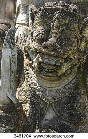 Indonesia, Bali, Sangsit, statue of the guardian angel of the temple Pura Meduwe Karang, representation of the demon View Large Photo Image Picture - Indonesia, Bali, Sangsit, statue of the guardian angel of the temple Pura Meduwe Karang, representation of the demon. Fotosearch
