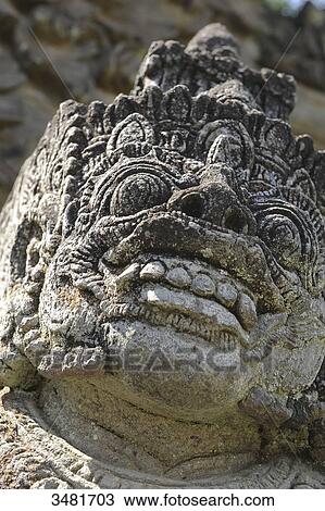 Indonesia, Bali, Sangsit, statue of the guardian angel of the temple Pura Meduwe Karang, representation of the good View Large Photo Image Stock Image - Indonesia, Bali, Sangsit, statue of the guardian angel of the temple Pura Meduwe Karang, representation of the good. Fotosearch
