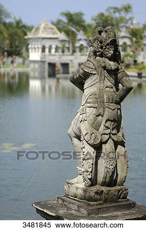 Indonesia, Bali, Taman Ujung (the Water palace) built by the king of Karangasem. The palace is surrounded by beautiful ponds with water lilies and statues View Large Photo Image Stock Photography - Indonesia, Bali, Taman Ujung (the Water palace) built by the king of Karangasem. The palace is surrounded by beautiful ponds with water lilies and statues. Fotosearch