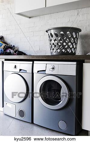 Stock Photograph - Interiors of a laundry room. Fotosearch