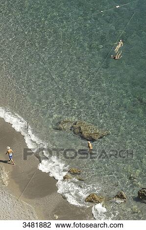 Italy, Amalfi Coast, Beach with an emerald sea near Amalfi. View Large Photo Image Stock Image - Italy, Amalfi Coast, Beach with an emerald sea near Amalfi.. Fotosearch