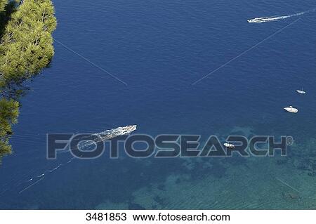 Stock Image - Italy, Amalfi Coast, Capri, Anacapri, Panoramic sight on the see from the viewpoint of the San Michele Villa garden.. Fotosearch