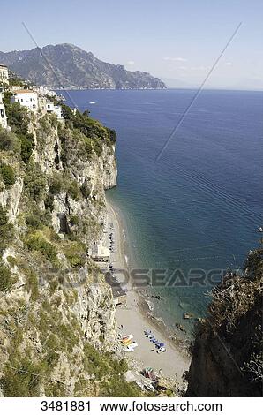 Italy, Amalfi Coast, Landscape, Panorama, Amalfi is a small Spanish-looking town whose high white houses are perched on the slopes of the hills in front of a deep blue sea. View Large Photo Image Stock Image - Italy, Amalfi Coast, Landscape, Panorama, Amalfi is a small Spanish-looking town whose high white houses are perched on the slopes of the hills in front of a deep blue sea.. Fotosearch
