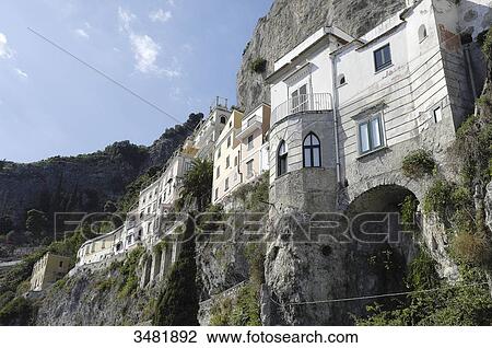 Italy, Amalfi Coast, Landscape, Panorama, Amalfi is a small Spanish-looking town whose high white houses are perched on the slopes of the hills in front of a deep blue sea. View Large Photo Image Stock Image - Italy, Amalfi Coast, Landscape, Panorama, Amalfi is a small Spanish-looking town whose high white houses are perched on the slopes of the hills in front of a deep blue sea.. Fotosearch