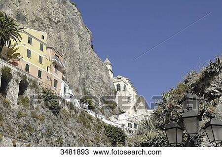 Stock Image - Italy, Amalfi Coast, Landscape, Panorama, Amalfi is a small Spanish-looking town whose high white houses are perched on the slopes of the hills in front of a deep blue sea.. Fotosearch
