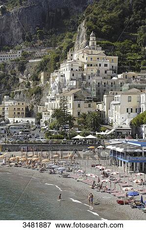 Italy, Amalfi Coast, Landscape, Panorama, Amalfi's shingle beach. Amalfi is a small town whose high white houses are perched on the slopes of the hills in front of a deep blue sea. View Large Photo Image Stock Photo - Italy, Amalfi Coast, Landscape, Panorama, Amalfi's shingle beach. Amalfi is a small town whose high white houses are perched on the slopes of the hills in front of a deep blue sea.. Fotosearch