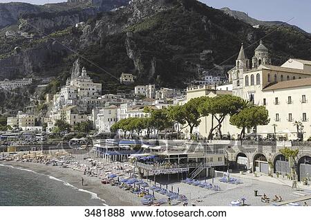 Italy, Amalfi Coast, Landscape, panorama, Amalfi's shingle beach. Amalfi is a small town whose high white houses are perched on the slopes of the hills in front of a deep blue sea. View Large Photo Image Stock Photo - Italy, Amalfi Coast, Landscape, panorama, Amalfi's shingle beach. Amalfi is a small town whose high white houses are perched on the slopes of the hills in front of a deep blue sea.. Fotosearch