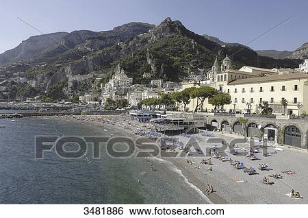 Italy, Amalfi Coast, Landscpae, Panorama, Amalfi's shingle beach. Amalfi is a small town whose high white houses are perched on the slopes of the hills in front of a deep blue sea. View Large Photo Image Stock Photograph - Italy, Amalfi Coast, Landscpae, Panorama, Amalfi's shingle beach. Amalfi is a small town whose high white houses are perched on the slopes of the hills in front of a deep blue sea.. Fotosearch