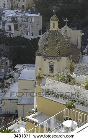 Italy, Amalfi Coast, Positano, old fishermen village built on a vertical axis with the Santa Maria Assunta church and its dome covered in varnished tiles View Large Photo Image Stock Image - Italy, Amalfi Coast, Positano, old fishermen village built on a vertical axis with the Santa Maria Assunta church and its dome covered in varnished tiles. Fotosearch