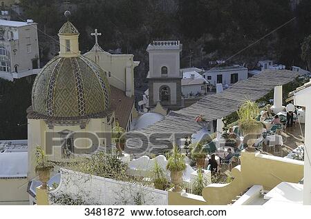 Italy, Amalfi Coast, Positano, old fishermen village with the Santa Maria Assunta church and its dome covered in varnished tiles View Large Photo Image Stock Image - Italy, Amalfi Coast, Positano, old fishermen village with the Santa Maria Assunta church and its dome covered in varnished tiles. Fotosearch