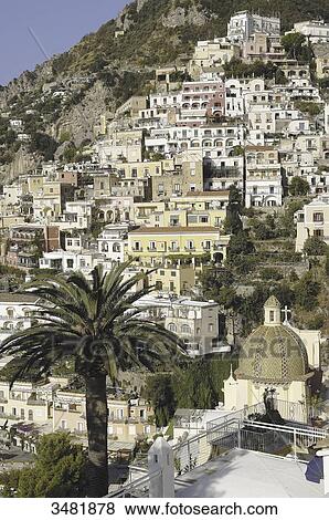 Italy, Amalfi coast, Positano, panorama on the old village of fishermen with the church Santa Maria assunta and his covered dome of glazed tiles, near the beach, View Large Photo Image Stock Photo - Italy, Amalfi coast, Positano, panorama on the old village of fishermen with the church Santa Maria assunta and his covered dome of glazed tiles, near the beach,. Fotosearch