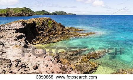 Landscape of rocks and sea, Petit Nevis, Saint-Vincent and the Grenadines, West Indies View Large Photo Image Stock Photo - Landscape of rocks and sea, Petit Nevis, Saint-Vincent and the Grenadines, West Indies. Fotosearch