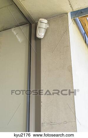 Low angle view of light on a window View Large Photo Image Stock Photograph - Low angle view of light on a window. Fotosearch