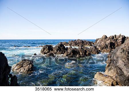 Madeira Island, volcanic rock in the sea View Large Photo Image Stock Photography - Madeira Island, volcanic rock in the sea. Fotosearch