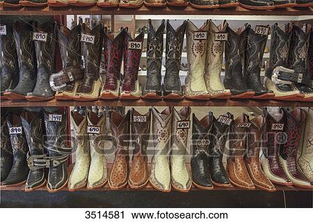 Stock Image - Mexico, Chihuahua State, Chihuahua, Store of cowboys boots. Fotosearch