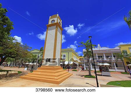 Mexico, Quintana Roo, Cozumel Island. The clock tower on Plaza Punta Langosta in San Miguel de Cozumel View Large Photo Image Stock Image - Mexico, Quintana Roo, Cozumel Island. The clock tower on Plaza Punta Langosta in San Miguel de Cozumel. Fotosearch