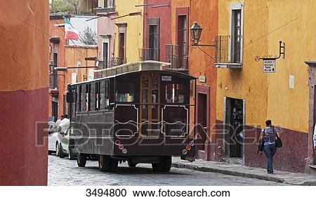 Mexico, State of Guanajuato, San Miguel de Allende, A street in the Old Town and bus View Large Photo Image Stock Image - Mexico, State of Guanajuato, San Miguel de Allende, A street in the Old Town and bus. Fotosearch