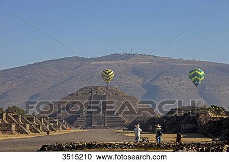 Stock Image - Mexico, State of Mexico. Balloons over the Pyramid of the Moon, pre-Columbian archaeological Teotihuacan., 200 BC, UNESCO World Heritage Site.. Fotosearch