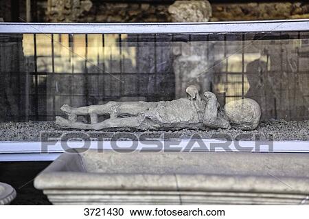 Molded plaster body of a dead child in Pompeii, Campania, Italy View Large Photo Image Stock Image - Molded plaster body of a dead child in Pompeii, Campania, Italy. Fotosearch