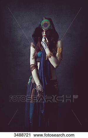 Mystical woman in ethnic dress View Large Photo Image Stock Image - Mystical woman in ethnic dress. Fotosearch
