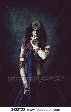Mystical woman in ethnic dress View Large Photo Image Stock Image - Mystical woman in ethnic dress. Fotosearch