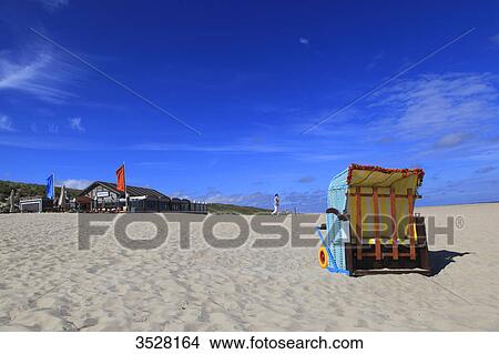 Nederlands. Wadden Islands archipelago. Vlieland island. Beach basket. View Large Photo Image Picture - Nederlands. Wadden Islands archipelago. Vlieland island. Beach basket.. Fotosearch
