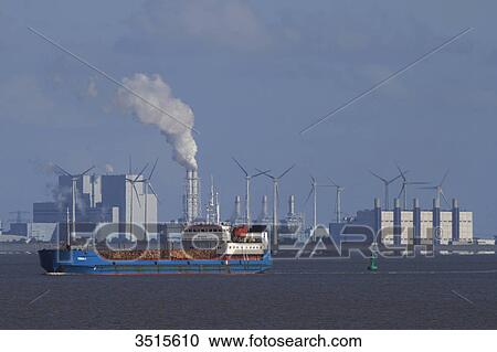 Netherlands, Groningen province, Eemshaven or Ems Harbour is a seaport. Ems estuary. Eemshaven Electrabel poxer plant. GDF Suez subsidiary. View Large Photo Image Stock Image - Netherlands, Groningen province, Eemshaven or Ems Harbour is a seaport. Ems estuary. Eemshaven Electrabel poxer plant. GDF Suez subsidiary.. Fotosearch