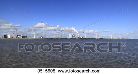 Netherlands, Groningen province, Eemshaven or Ems Harbour is a seaport. Ems estuary. Eemshaven Electrabel poxer plant. GDF Suez subsidiary. View Large Photo Image Stock Photo - Netherlands, Groningen province, Eemshaven or Ems Harbour is a seaport. Ems estuary. Eemshaven Electrabel poxer plant. GDF Suez subsidiary.. Fotosearch