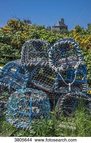 Picture - Normandy, Manche, the Grande Ile Chausey, lobster traps and the chapel. Fotosearch