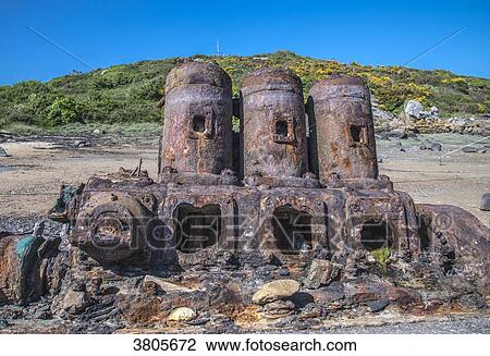 Normandy, Manche, the Grande Ile Chausey, remains of the engine of an old boat of the beach View Large Photo Image Stock Image - Normandy, Manche, the Grande Ile Chausey, remains of the engine of an old boat of the beach. Fotosearch