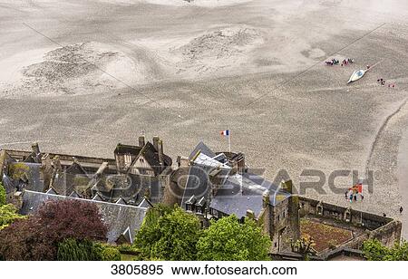 Stock Photography - Normandy, Mont Saint Michel village and bay from the Abbey (UNESCO World Heritage) (on the way to Santiago de Compostela). Fotosearch