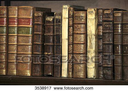 Old books in a library. View Large Photo Image Stock Photo - Old books in a library.. Fotosearch