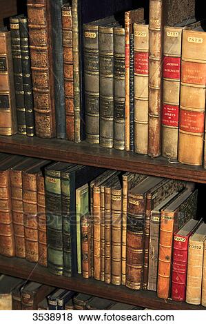 Stock Photo - Old books in a library.. Fotosearch