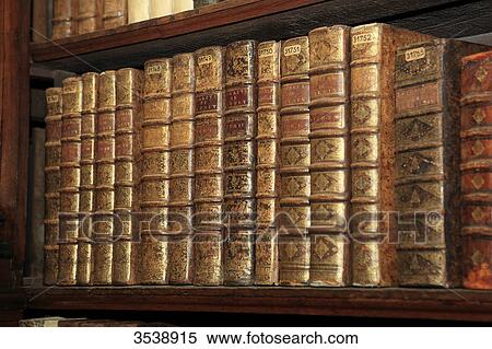 Stock Photography - Old books in a library.. Fotosearch