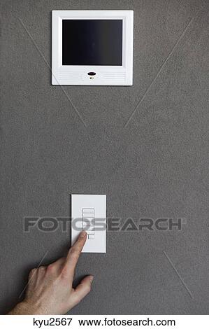 Person pressing switches of a security camera control panel View Large Photo Image Stock Photo - Person pressing switches of a security camera control panel. Fotosearch