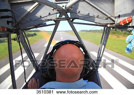 Stock Image - Pilot at landing. Fotosearch