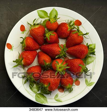 Plate of strawberries View Large Photo Image Stock Photo - Plate of strawberries. Fotosearch