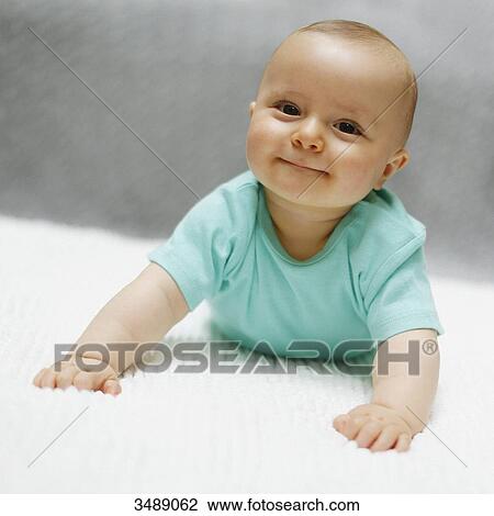 Portrait of a 8 months baby boy View Large Photo Image Stock Image - Portrait of a 8 months baby boy. Fotosearch